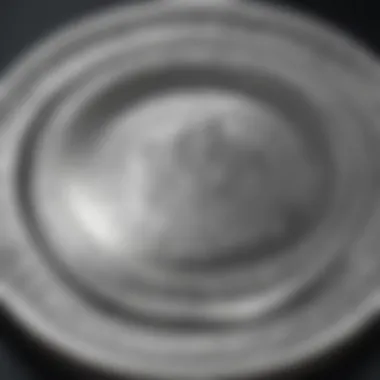 Silver Coins: A Circular Reflection of Value Silver coins arranged in a circular pattern reflecting light